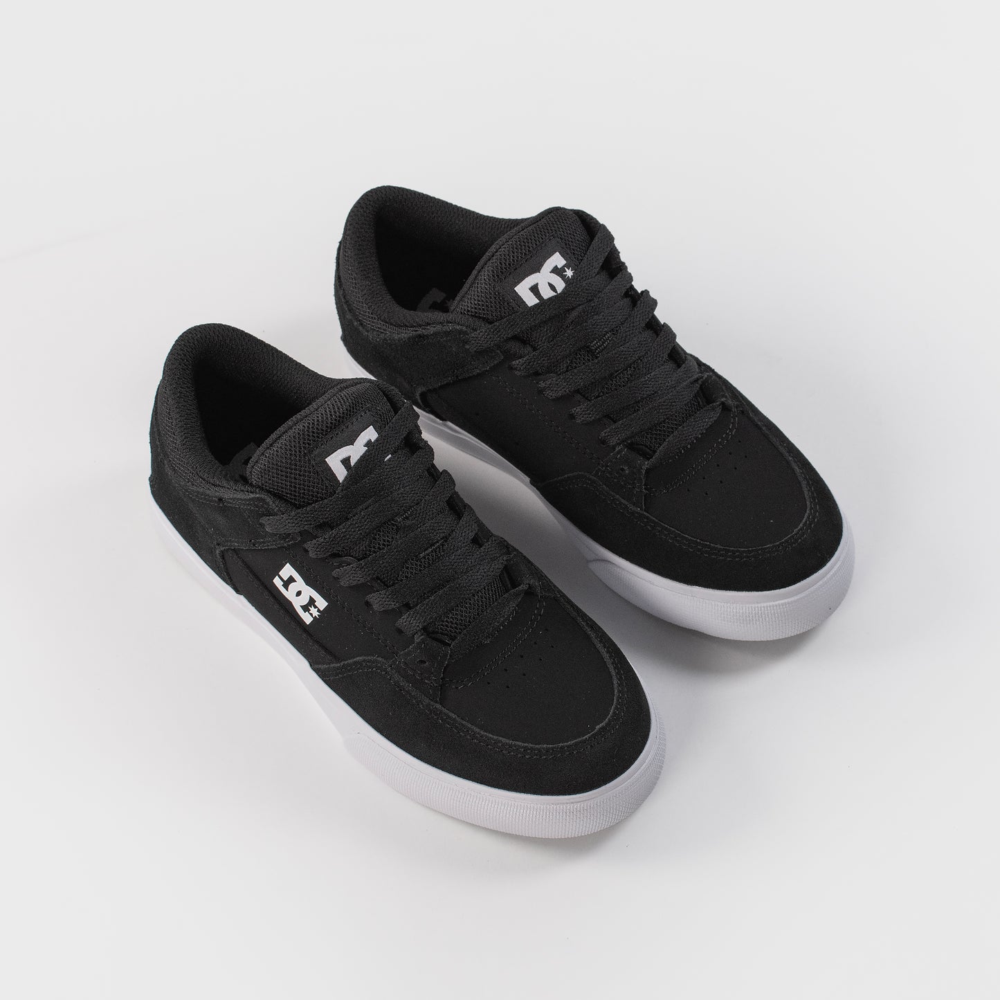 Anle view of the DC Onyx Kids Shoes - Black/ White, available at Prime Delux Store, Plymouth, Devon, UK.