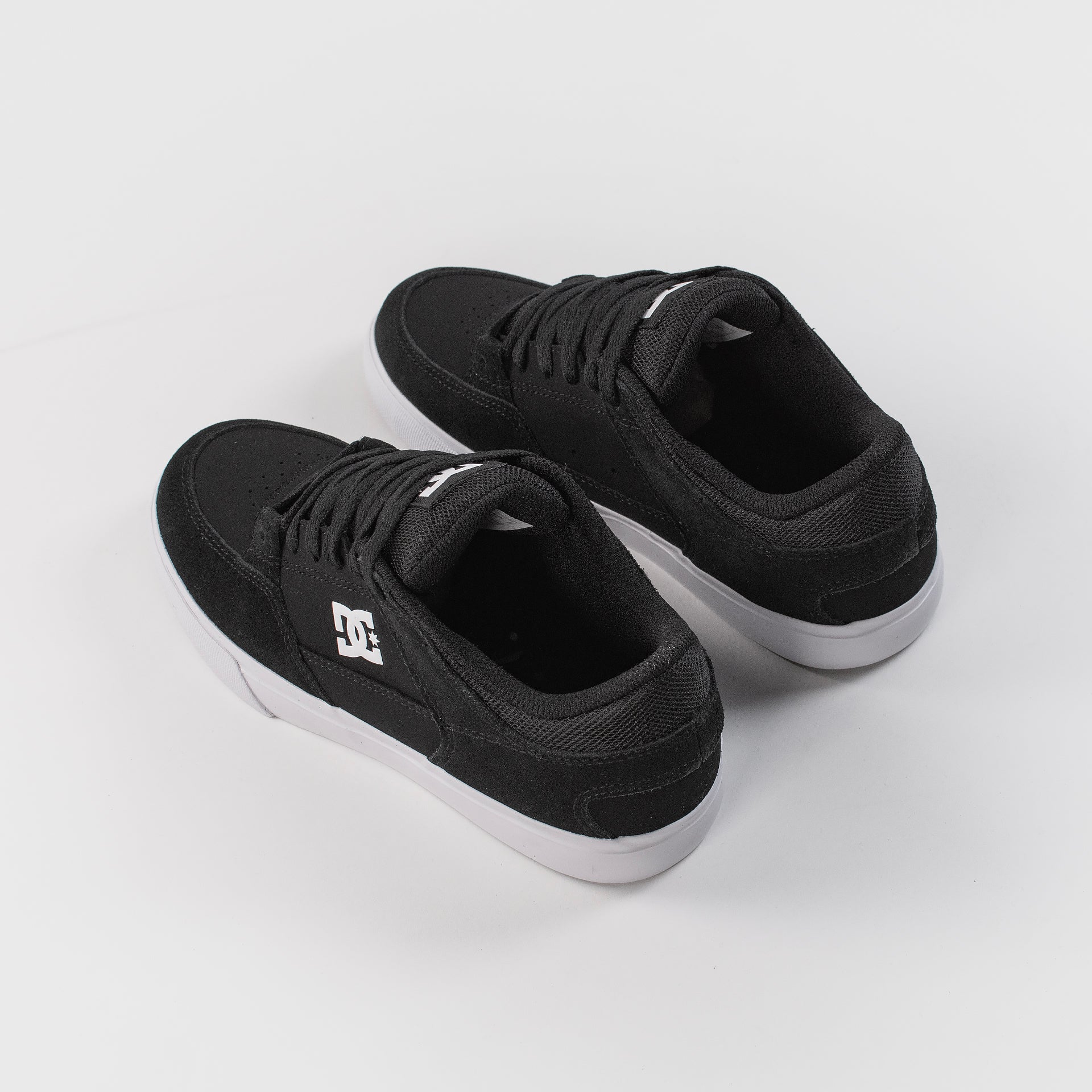 Behind view of the DC Onyx Kids Shoes - Black/ White, available at Prime Delux Store, Plymouth, Devon, UK.